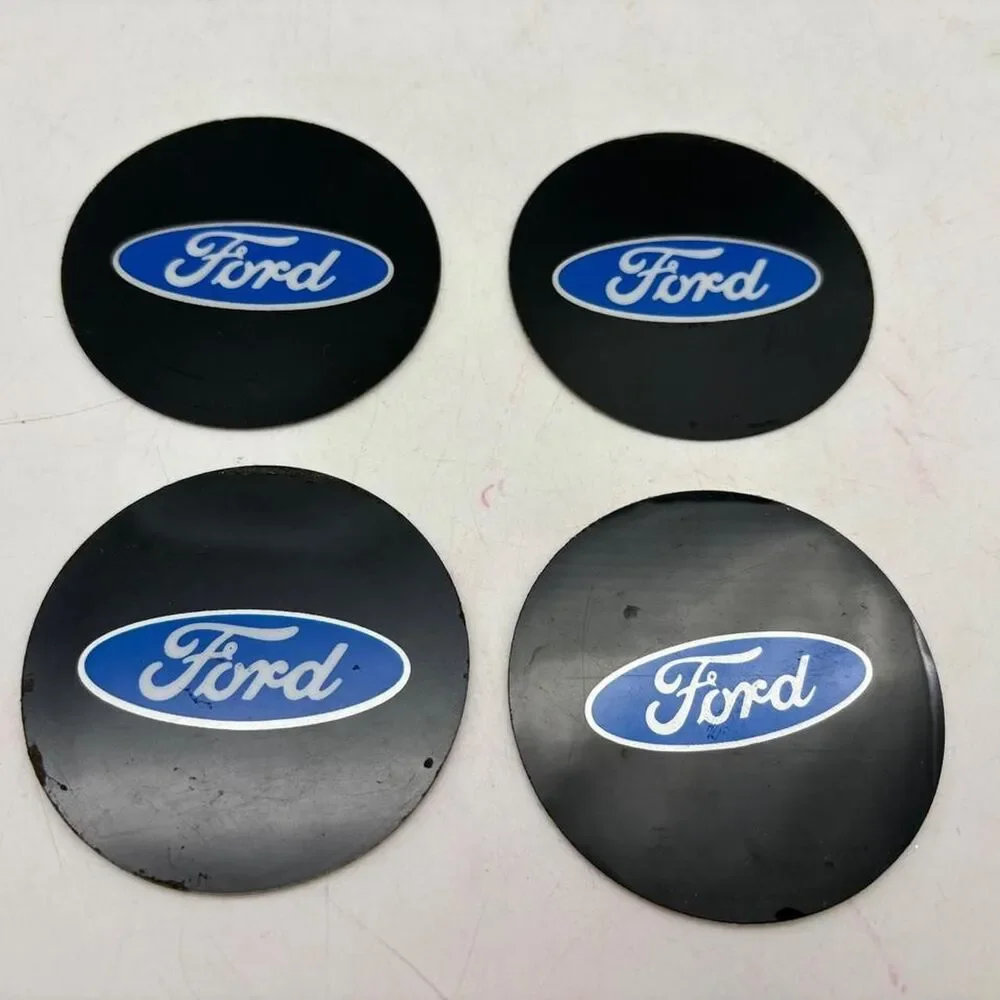 Ford center caps with blue oval logo